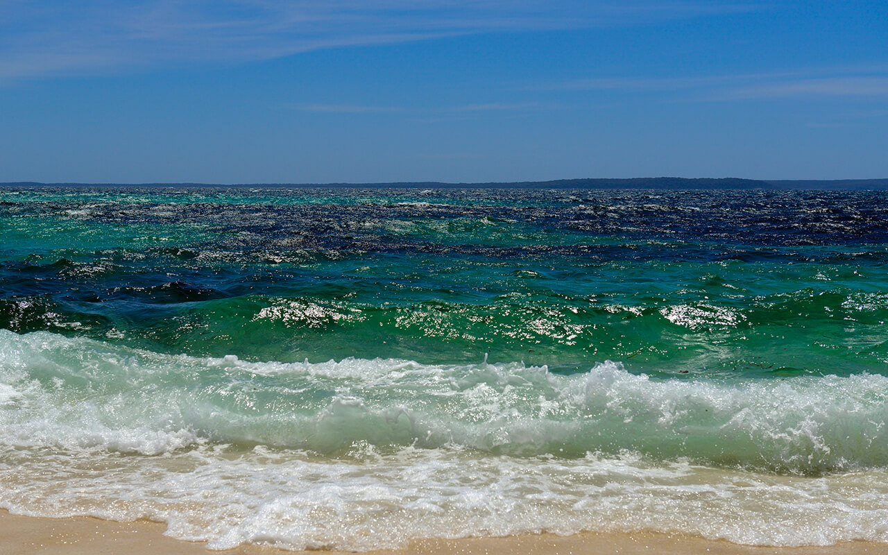 This beautiful surf is worth travelling from Sydney to Jervis Bay