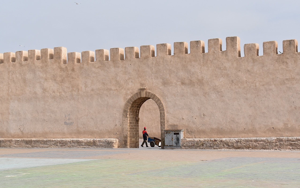 Behind this Essaouira wall lies a market where to do some haggling in Morocco