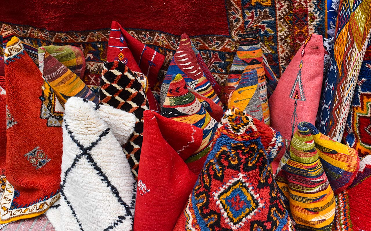 Colourful rugs will require some serious haggling in Morocco