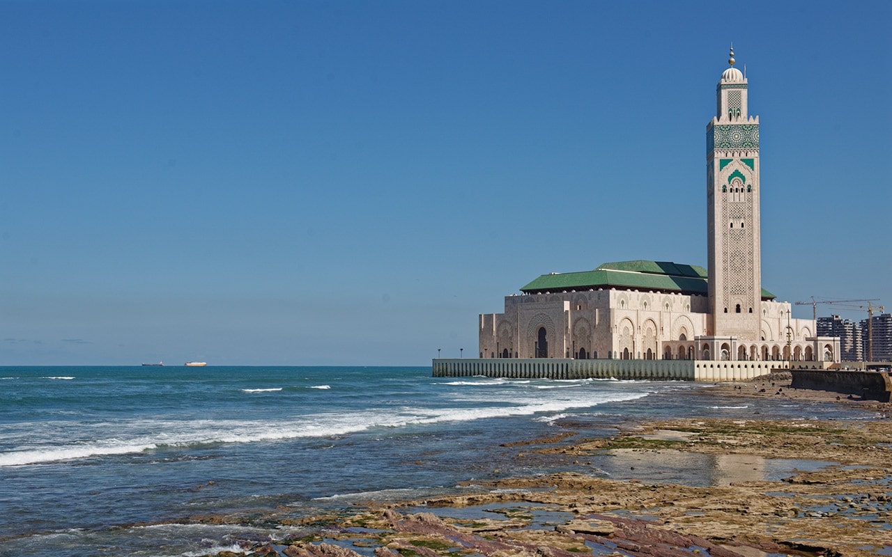 The Hassan II mosque is on the edge of the Morocco Atlantic Coast in Casablanca