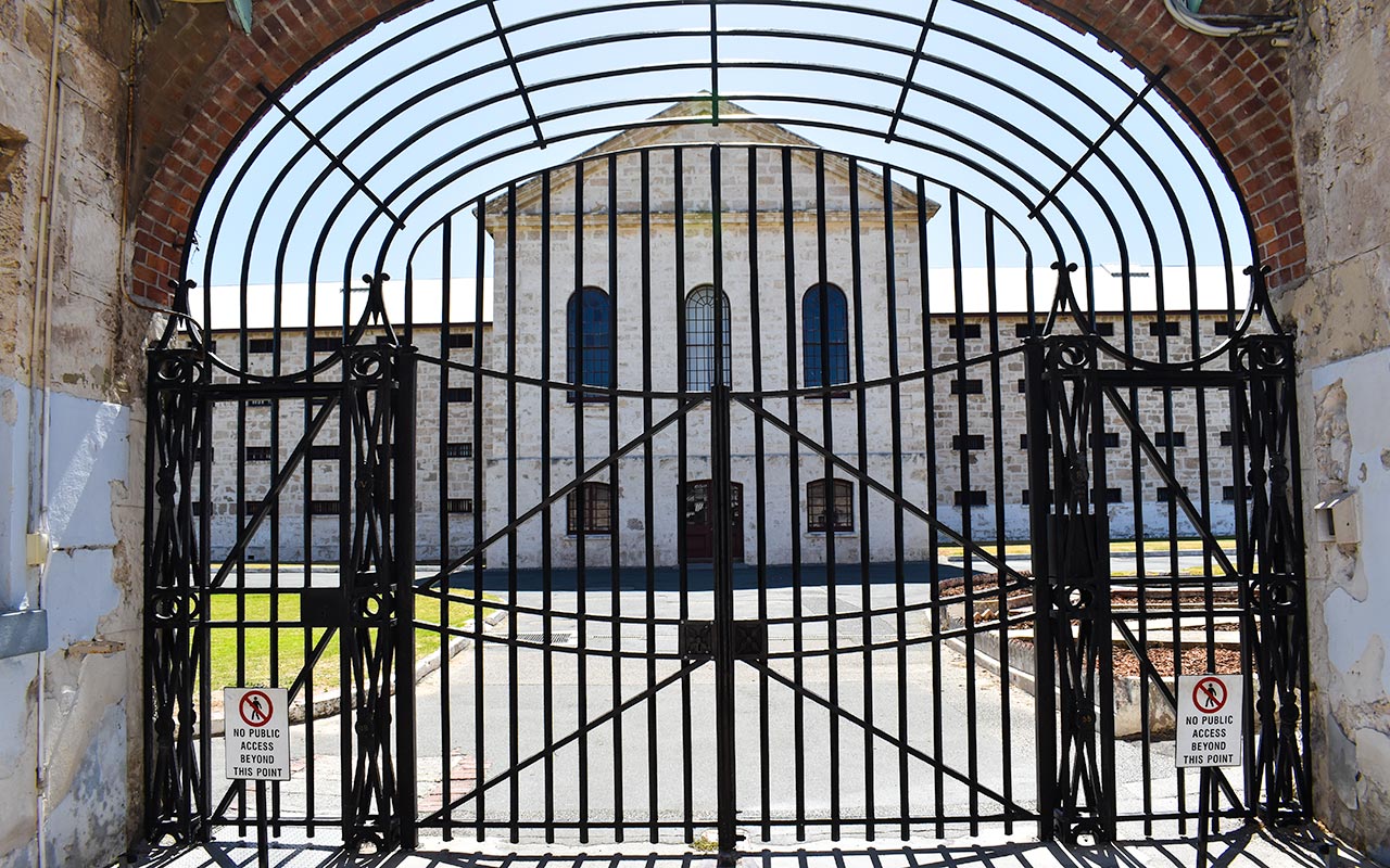 Enter the Fremantle Prison via a daunting gate