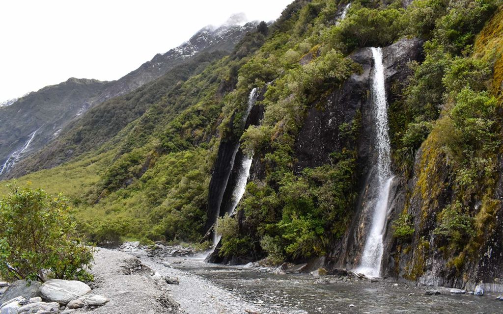 Stop by the waterfall on the way to Franz Josef Glacier