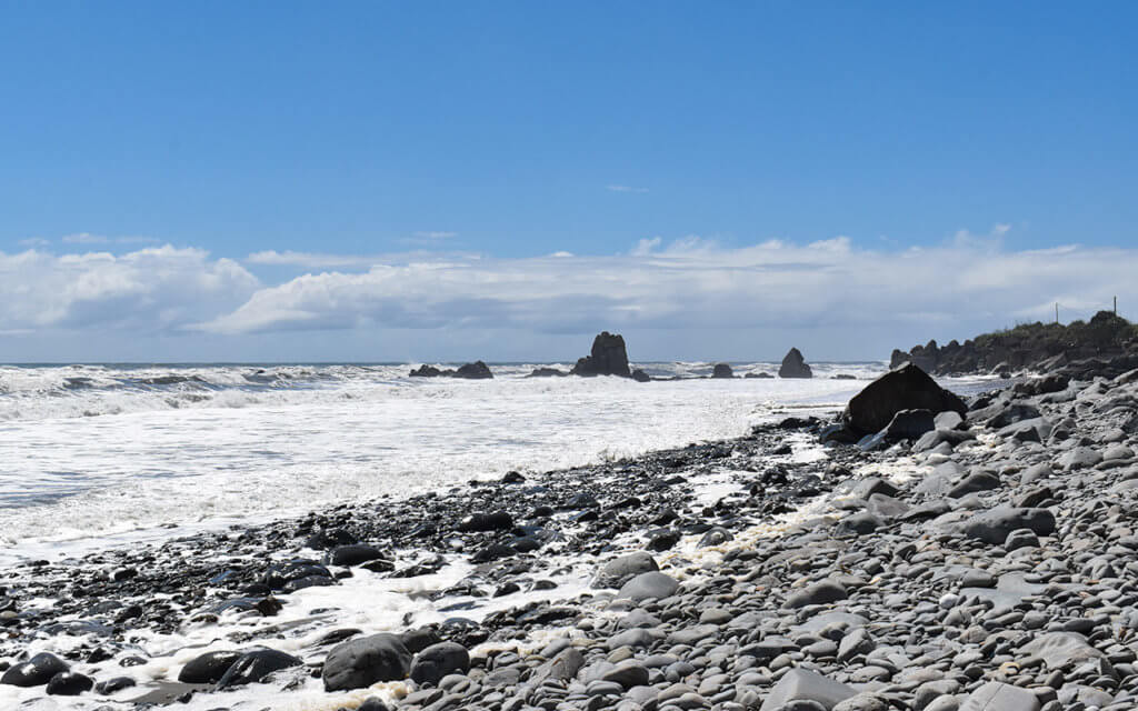 New Zealand beaches are full of pebbles and volcanic sand