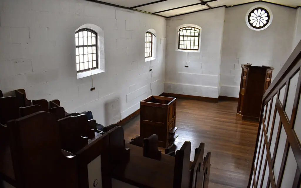 The chapel within the Separate Prison has individual booths for convicts to attend mass