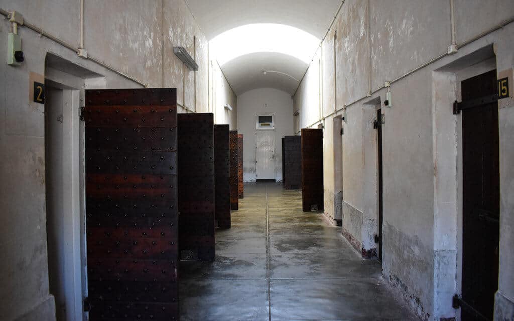 At Fremantle Prison, the isolation cells are small and dark, and with very heavy doors